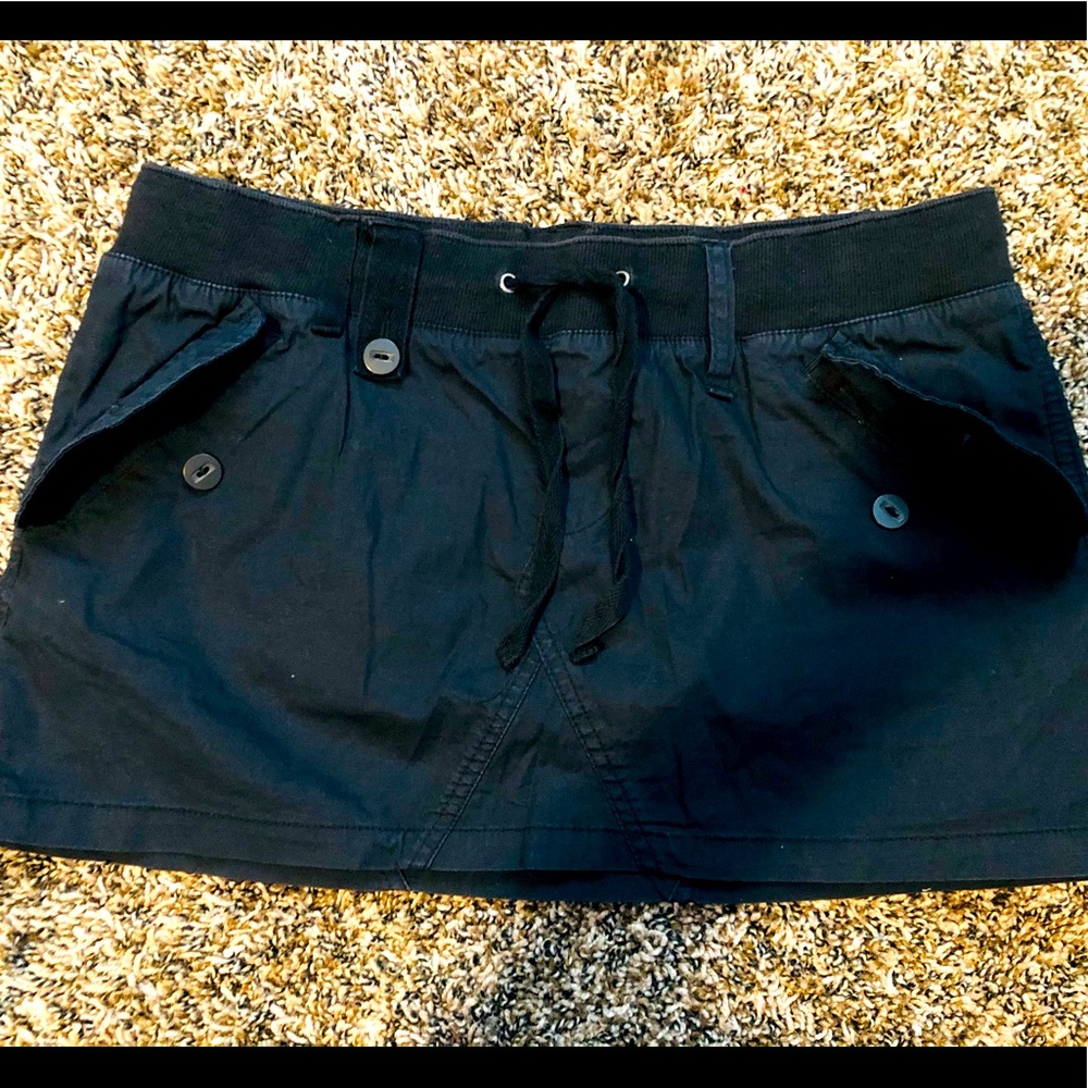 Personal Identity Black Utility mini skirt W/Flap Button pockets. Sz.11